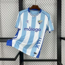 Camisa I Málaga | 25/26 Torcedor Hummel - Branca e Azul