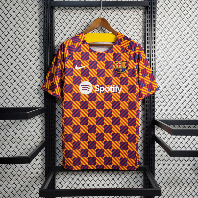 Camisa Treino Barcelona | 23/24 Torcedor Nike - Vermelho/Azul e Amarelo