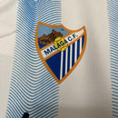Camisa I Málaga | 23/24 Torcedor Hummel - Branca e Azul