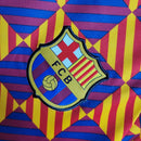 Camisa Treino Barcelona | 23/24 Torcedor Nike - Vermelho/Azul e Amarelo