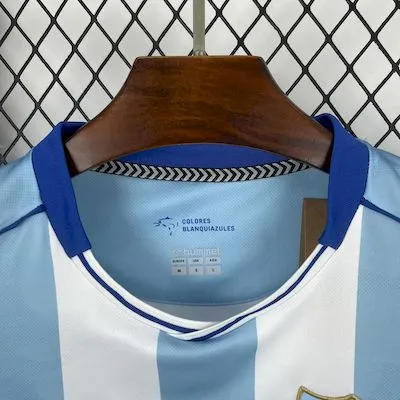 Camisa I Málaga | 25/26 Torcedor Hummel - Branca e Azul