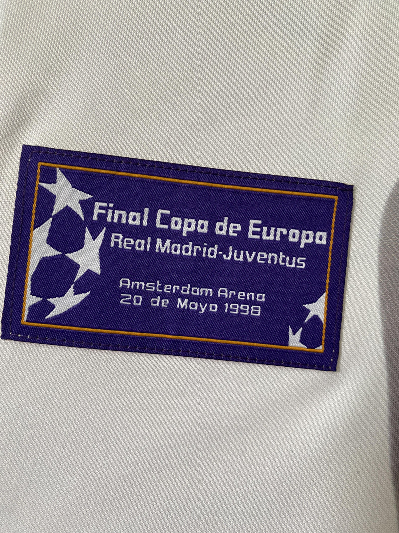 Camisa Champions League Real Madrid Retrô | 97/98 Torcedor Kelme - Branca e Roxa