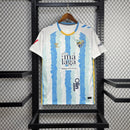 Camisa I Málaga | 24/25 Torcedor Hummel - Branca e Azul