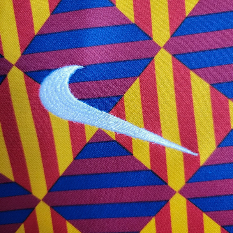 Camisa Treino Barcelona | 23/24 Torcedor Nike - Vermelho/Azul e Amarelo