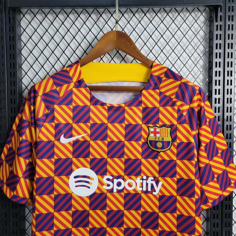 Camisa Treino Barcelona | 23/24 Torcedor Nike - Vermelho/Azul e Amarelo