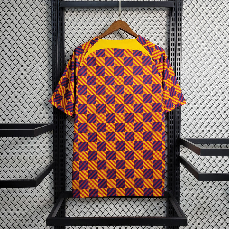 Camisa Treino Barcelona | 23/24 Torcedor Nike - Vermelho/Azul e Amarelo
