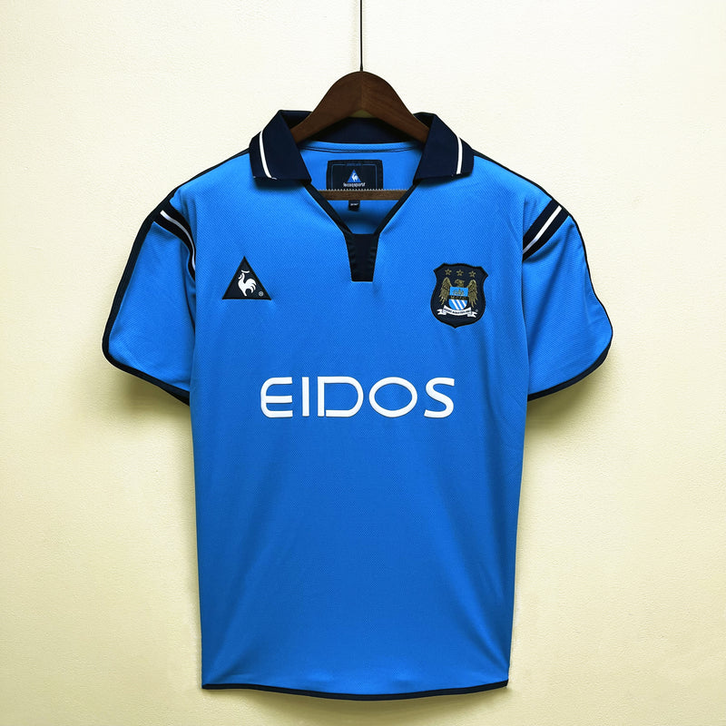 Camisa I Manchester City Retrô | 02/03 Torcedor Le Coq Sportif - Azul