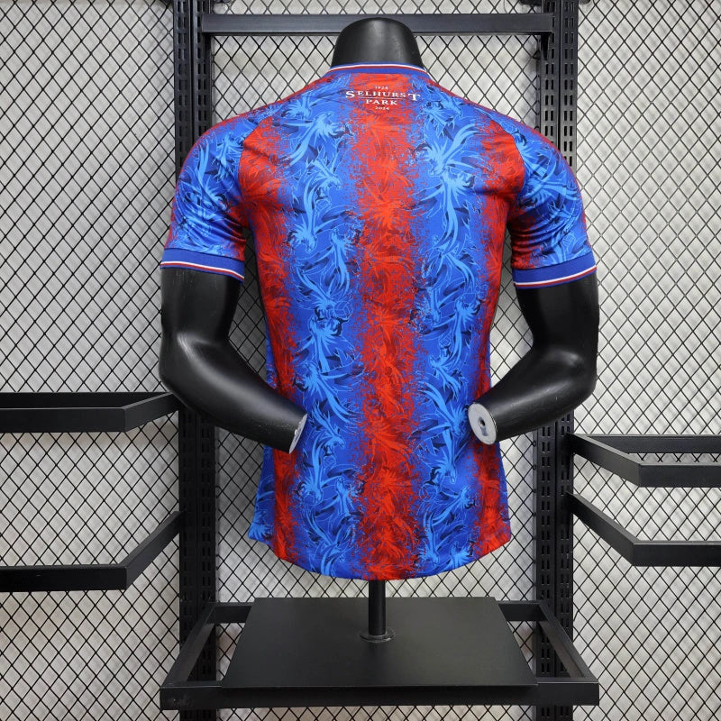 Camisa I Crystal Palace| 24/25 Modelo Jogador Macron - Azul e Vermelha